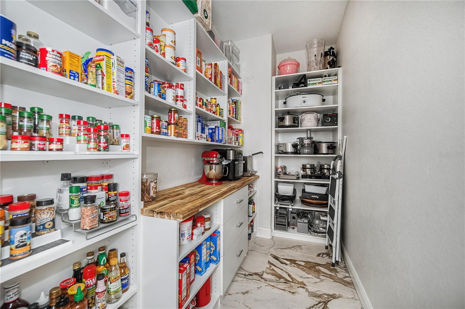Walk In Pantry Off Kitchen with Custom Cabinetry - 290 TAIT TER SE, PORT CHARLOTTE