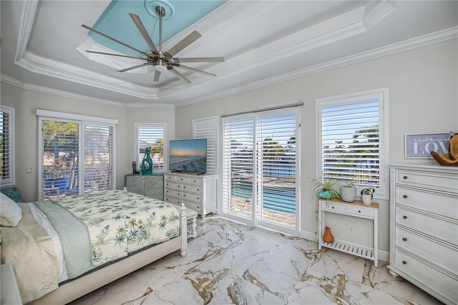 Primary Bedroom Floor 1 with Pool Access, Views down the Harbor, Two Walk in Closets and Luxurious On Suite Bathroom - 290 TAIT TER SE, PORT CHARLOTTE