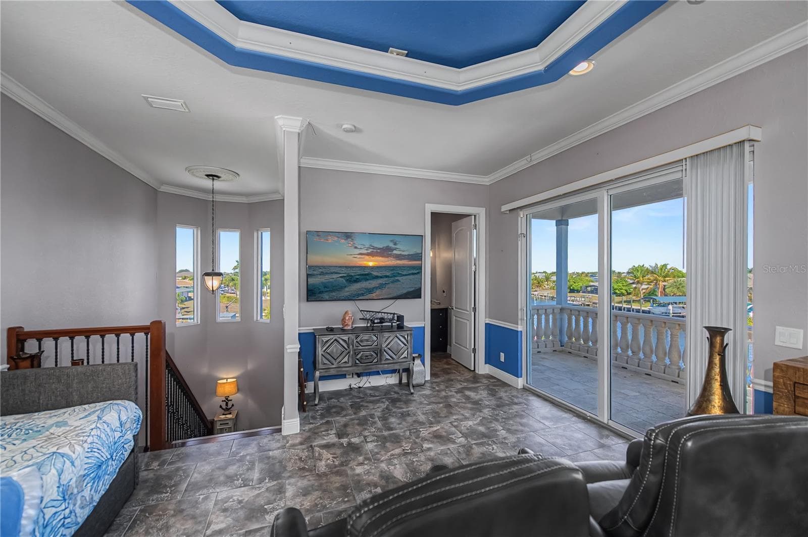 Primary Bedroom Second Floor with Harbor Views, Balcony, and Living Room - 290 TAIT TER SE, PORT CHARLOTTE
