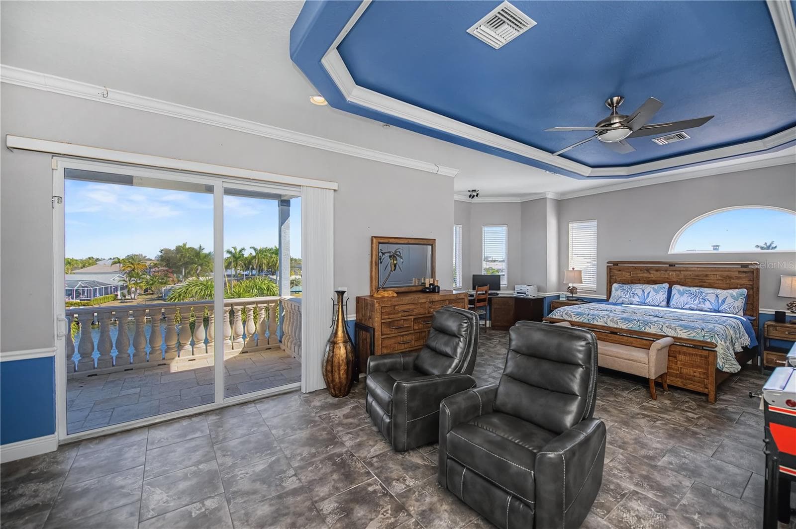 Primary Bedroom Second Floor with Harbor Views, Balcony, On Suite Bathroom, and Space for Built in office Plus Living Room - 290 TAIT TER SE, PORT CHARLOTTE