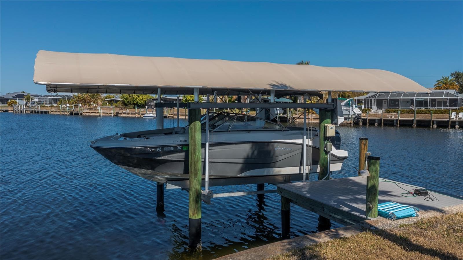 Covered Boat Lift 2 with Daily Boat with Composite Dock - 290 TAIT TER SE, PORT CHARLOTTE
