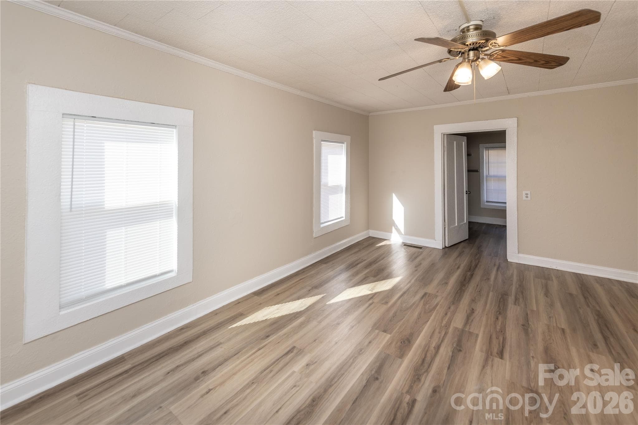 Primary Bedroom with access to laundry room - 470 & 460 S Moose Road, Mount Pleasant