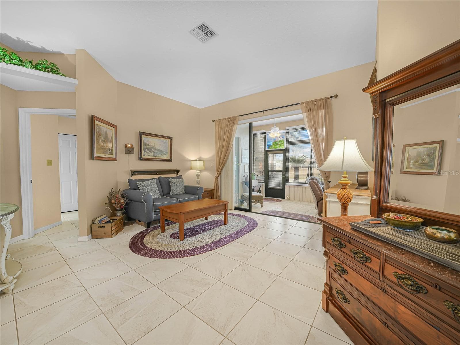 Living Room opens to Florida Room - 5888 SANDPIPERS DR, LAKELAND