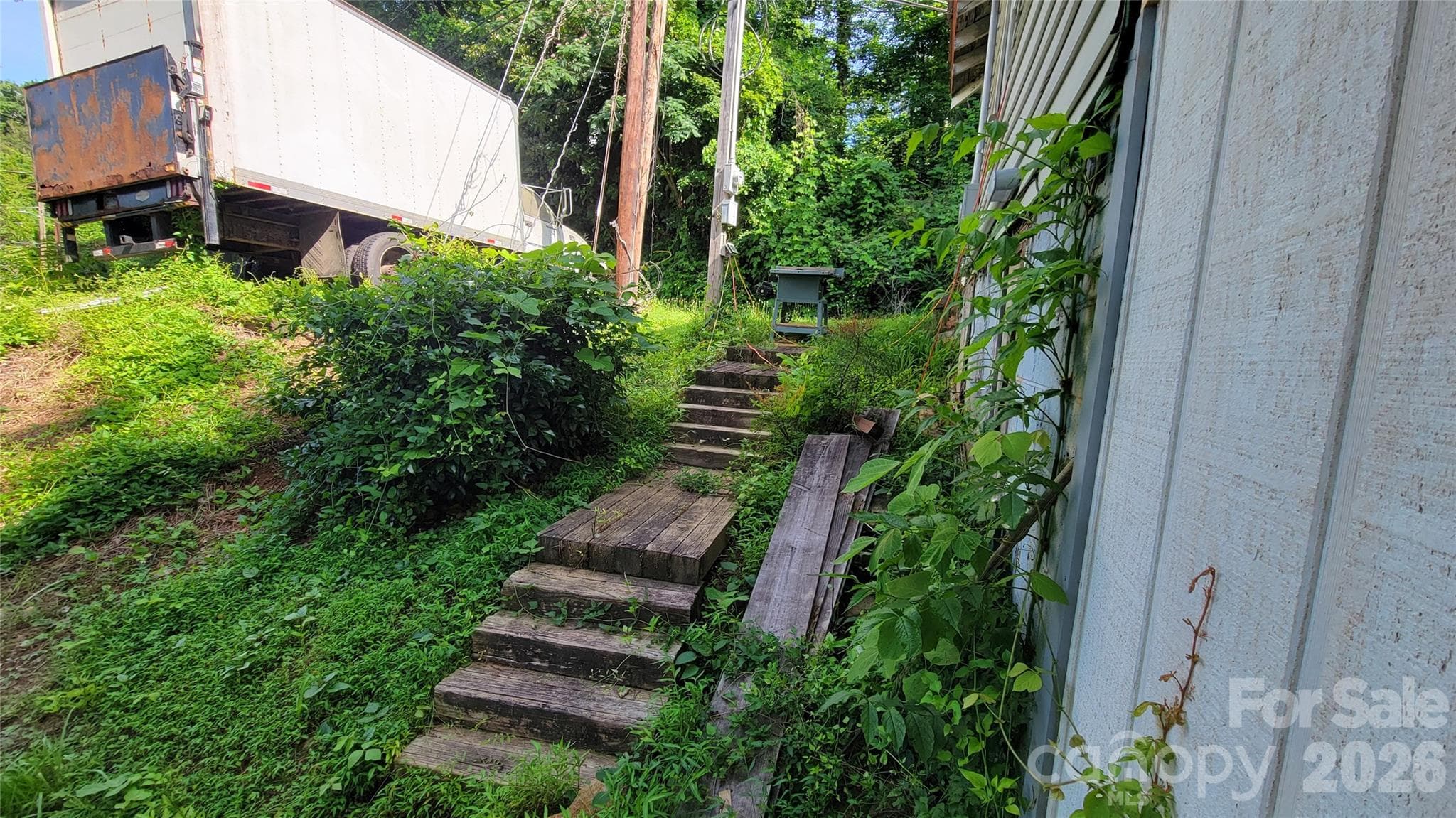 stairs from right of basement - 160 Cleveland Road, Tryon