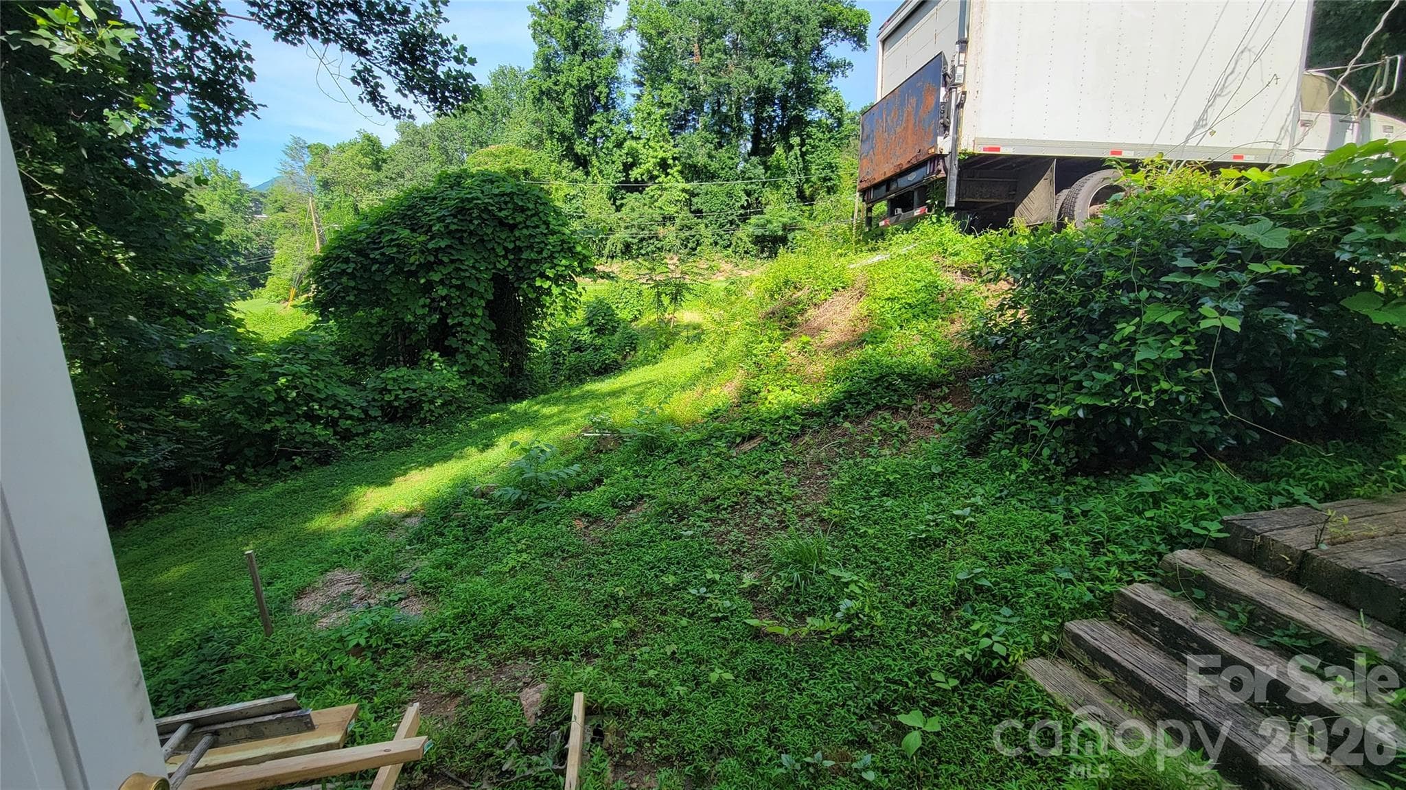 looking over right lots from basement - 160 Cleveland Road, Tryon