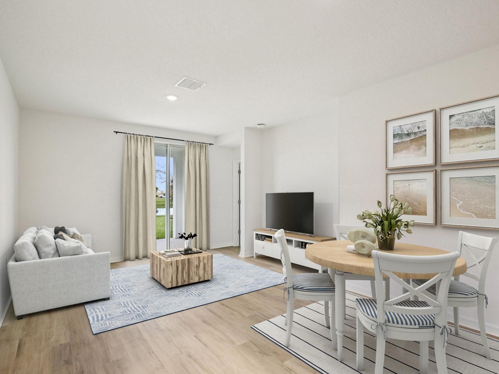 Interior photos are not of the actual home but are photos of the builder home with same floorplan with similar interior finishes and features. Photo uses virtual staging. - 161 CANOE BEND AVE, NOKOMIS