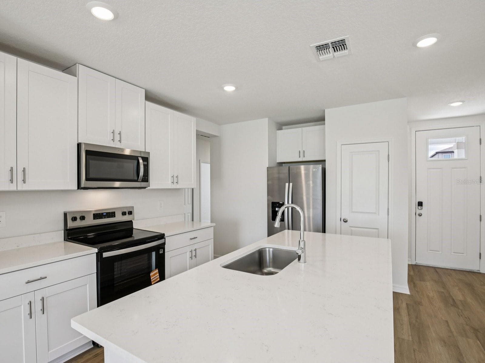 Interior photos are not of the actual home but are photos of the builder home with the same floorplan with similar interior finishes and features. - 161 CANOE BEND AVE, NOKOMIS