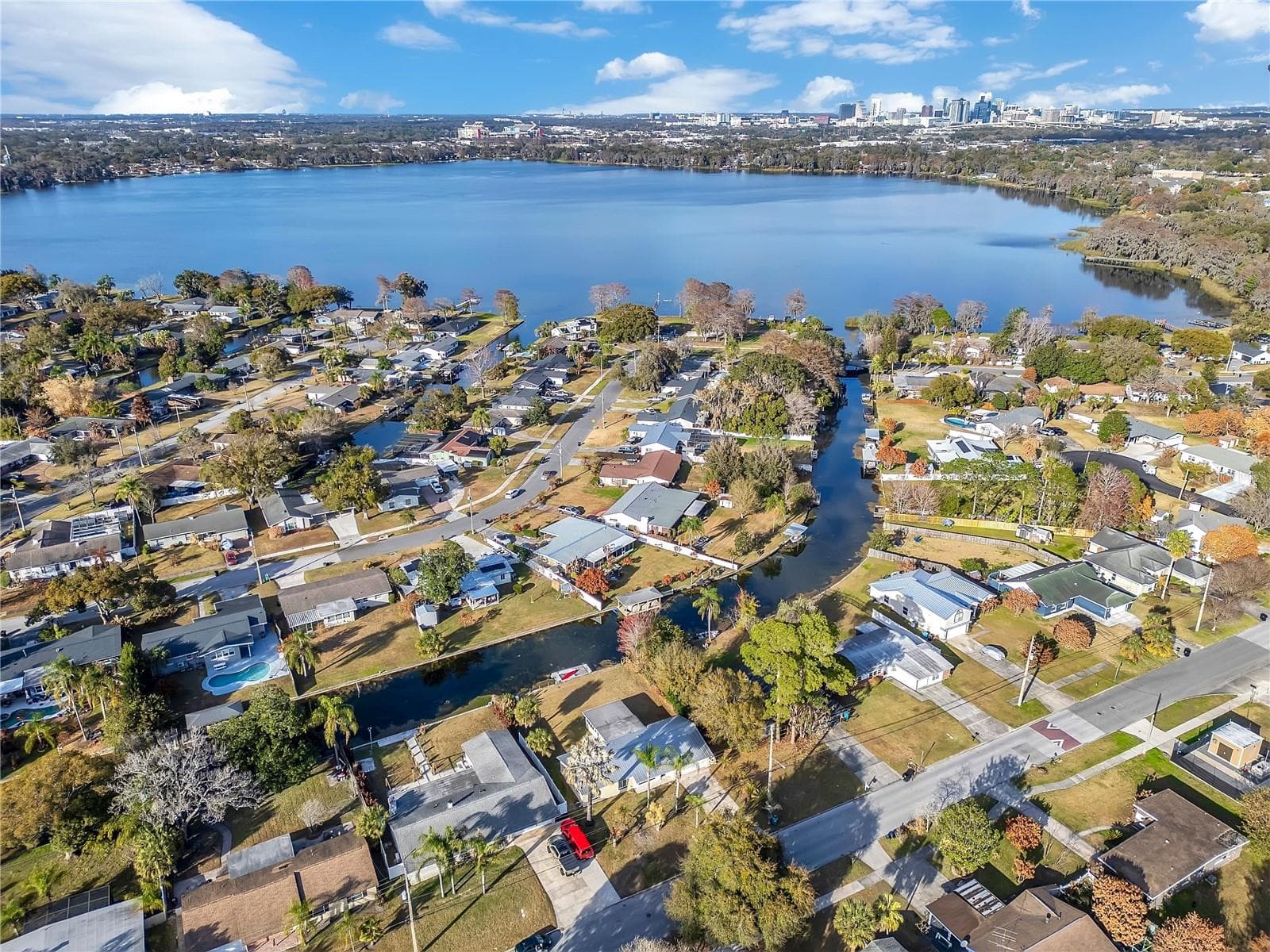Drone View Showing Canal Exiting to Clear Lake and View of Orlando Skyline - 2801 GULFSTREAM RD, ORLANDO