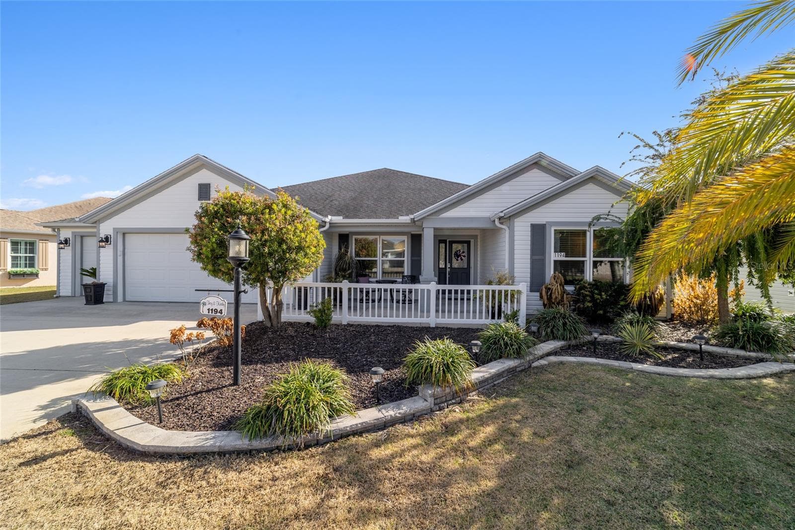 Enhanced landscaping compliments the exterior - 1194 MCDONOUGH PL, THE VILLAGES