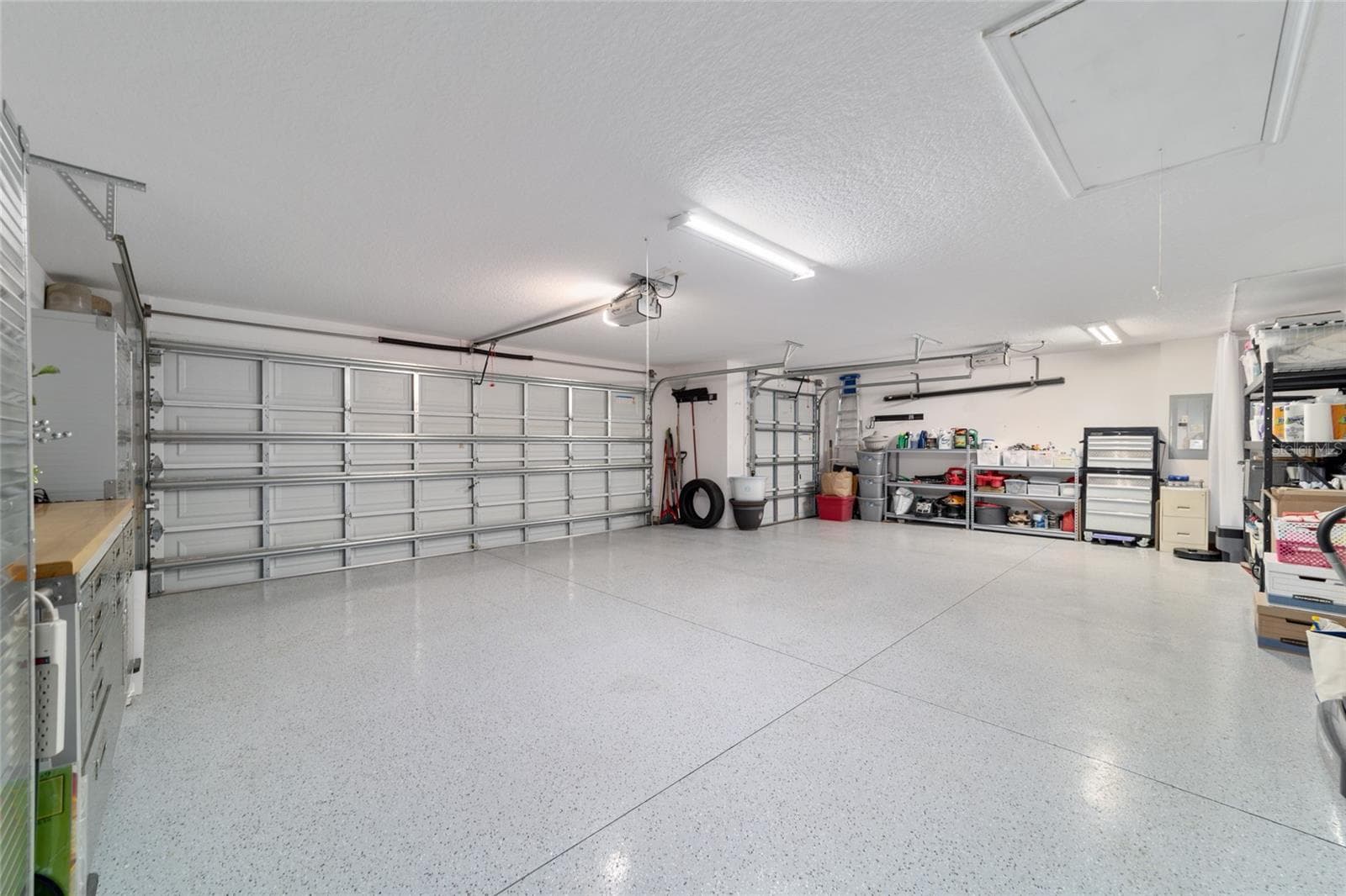 Oversized two car plus golf cart garage with room for all of your Village toys! - 1194 MCDONOUGH PL, THE VILLAGES