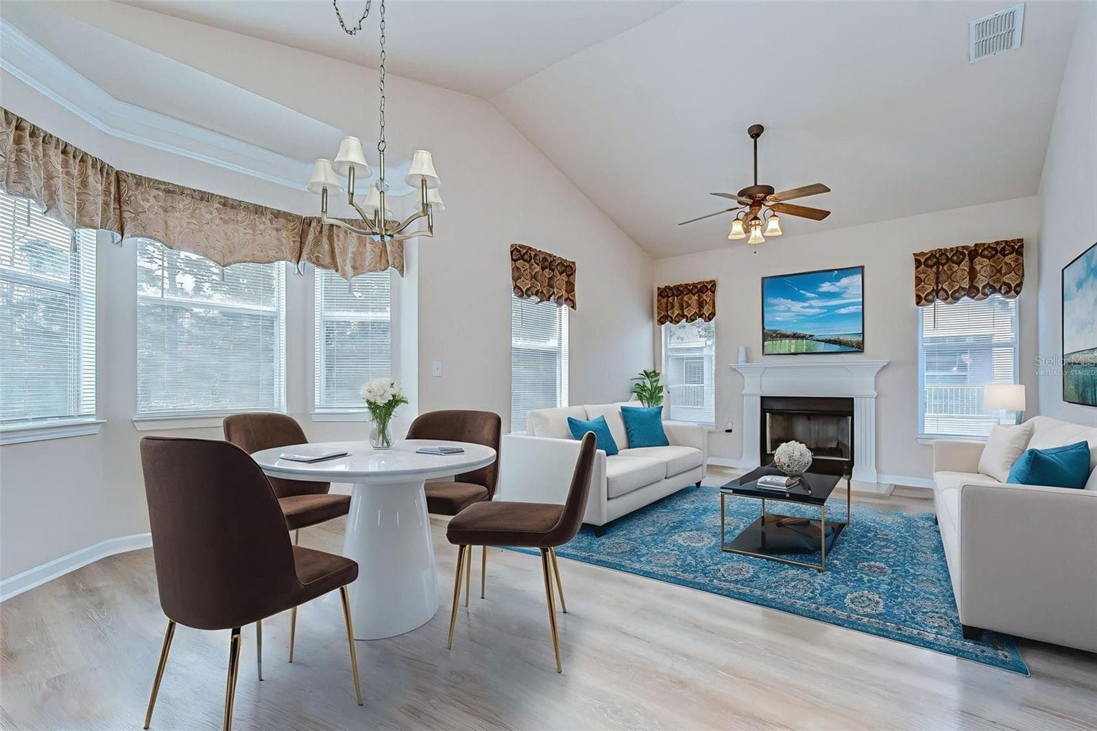 Virtually staged living room - 10409 VILLA VIEW CIR #10409, TAMPA