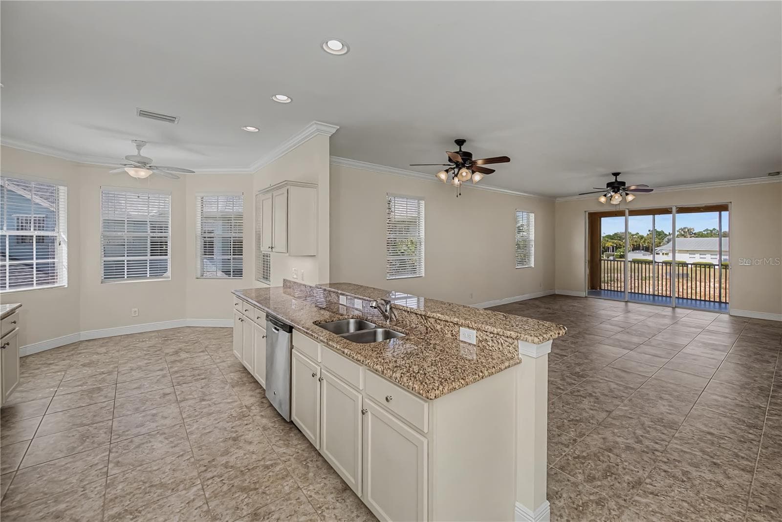 super kitchen opens to the great room - 25601 HERITAGE LAKE BLVD #46, PUNTA GORDA