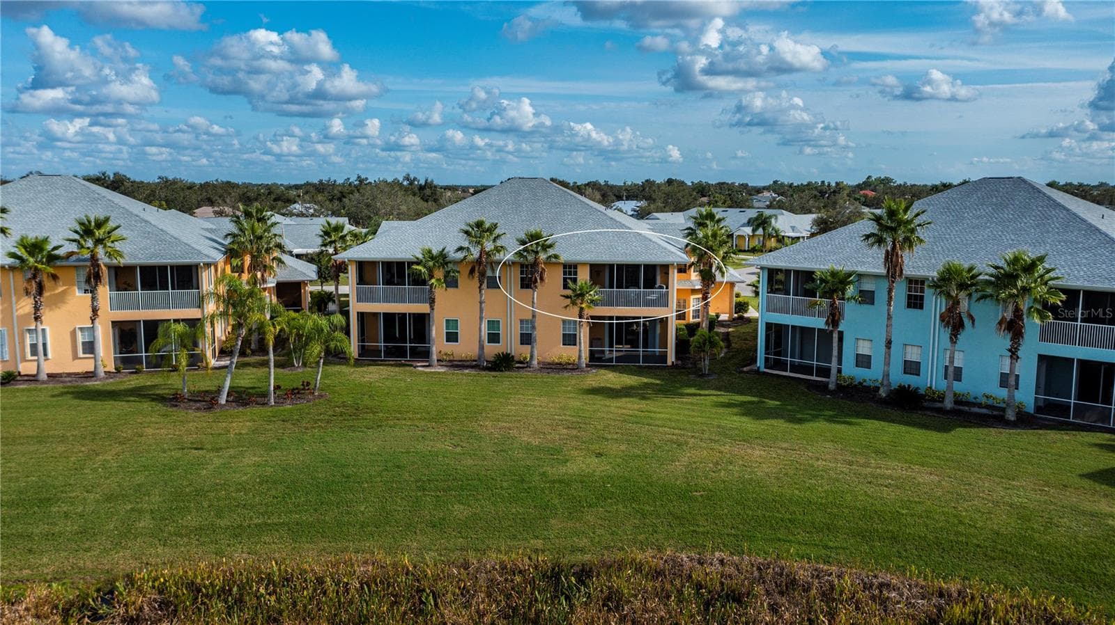private backyard view from your own balcony lanai - 25601 HERITAGE LAKE BLVD #46, PUNTA GORDA