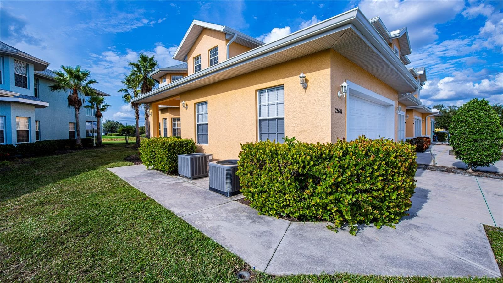 pristinely kept landscaping - 25601 HERITAGE LAKE BLVD #46, PUNTA GORDA