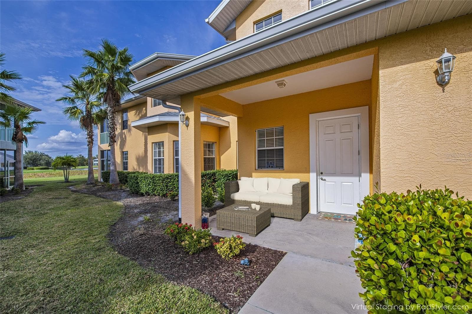 Enter through your private garage or front foyer door - virtually staged - freshly mulched - 25601 HERITAGE LAKE BLVD #46, PUNTA GORDA