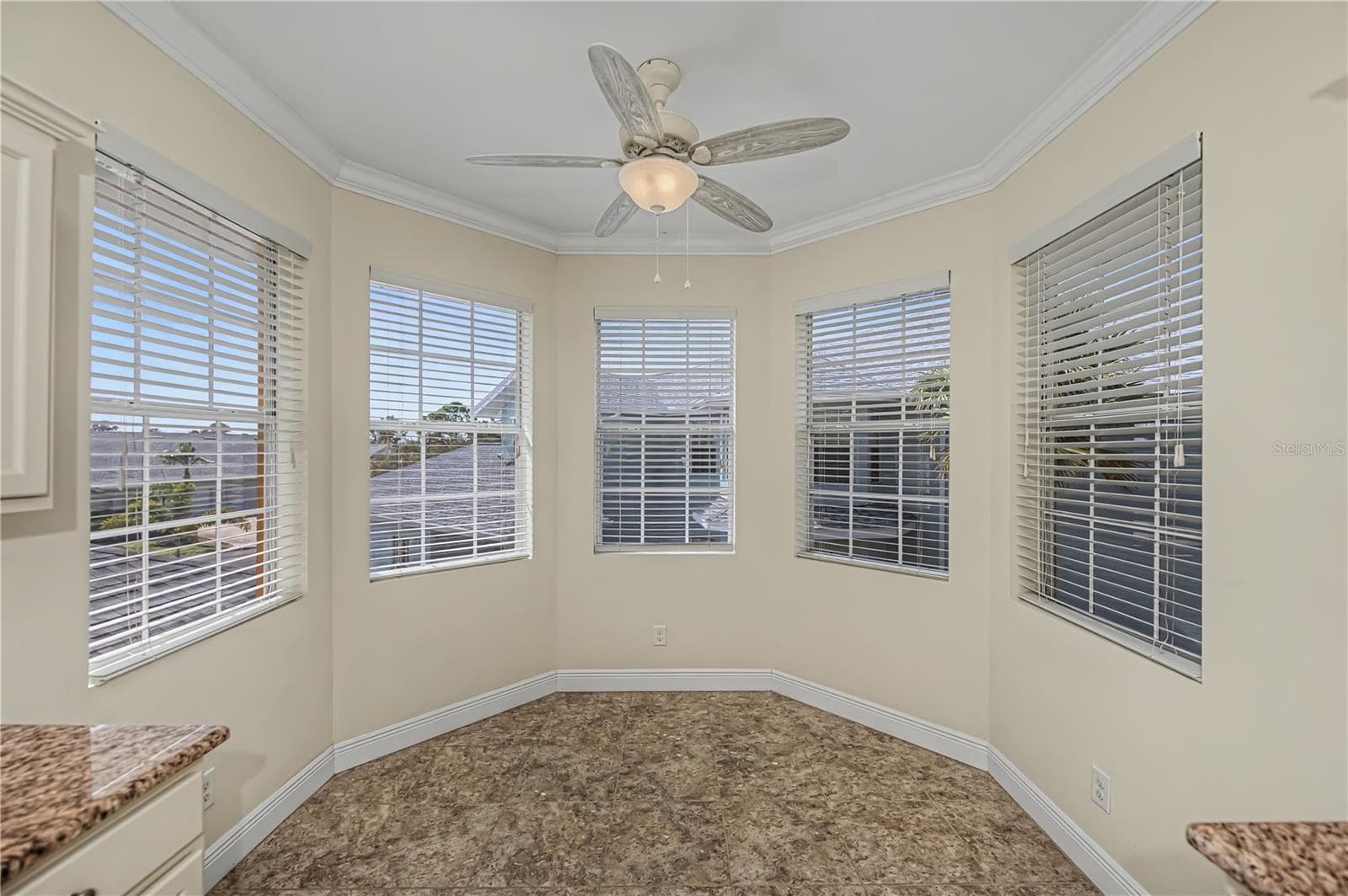 spacious informal dining nook - 25601 HERITAGE LAKE BLVD #46, PUNTA GORDA