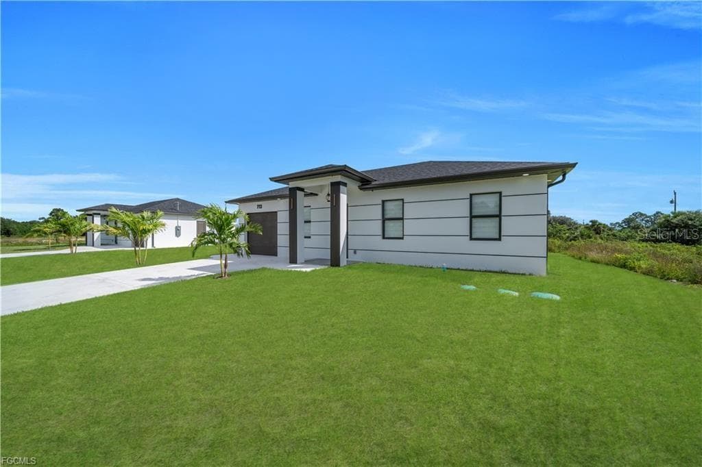 Single Family Residence at 711 ROMA AVE S, LEHIGH ACRES, photo 2 of 38
