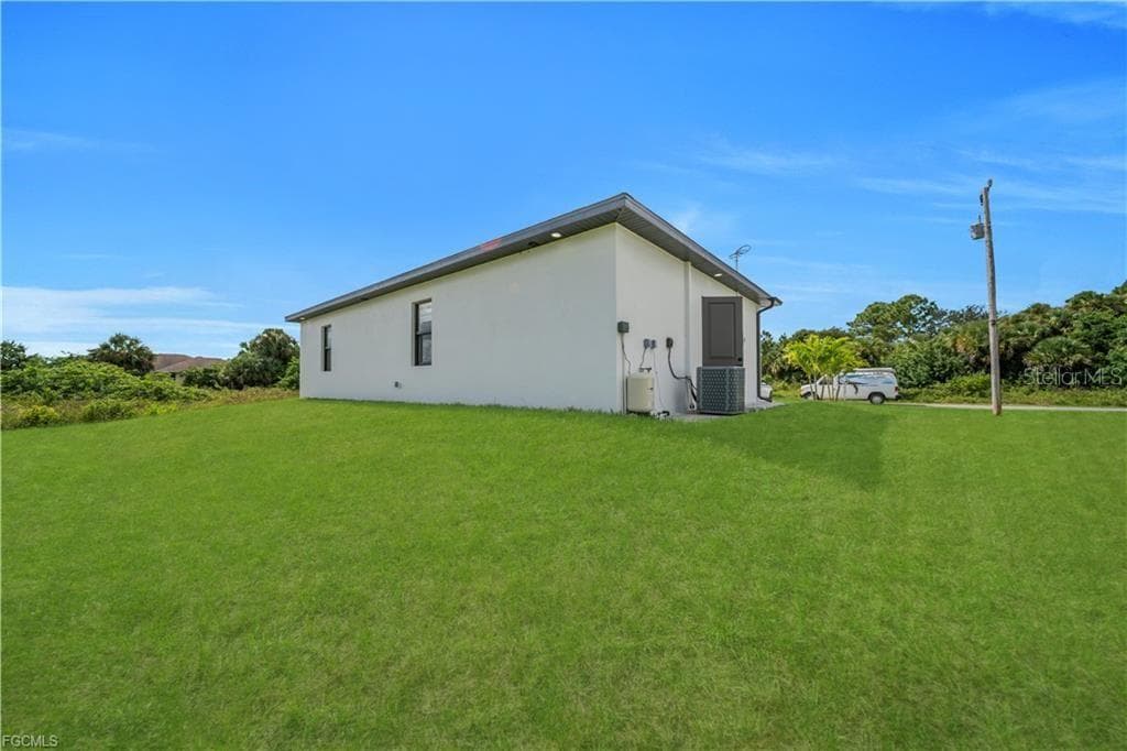 Single Family Residence at 711 ROMA AVE S, LEHIGH ACRES, photo 25 of 38