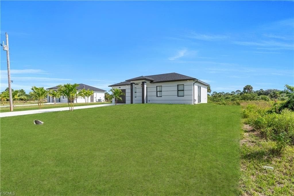 Single Family Residence at 711 ROMA AVE S, LEHIGH ACRES, photo 27 of 38