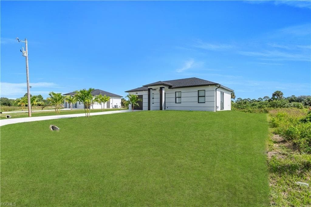 Single Family Residence at 711 ROMA AVE S, LEHIGH ACRES, photo 28 of 38