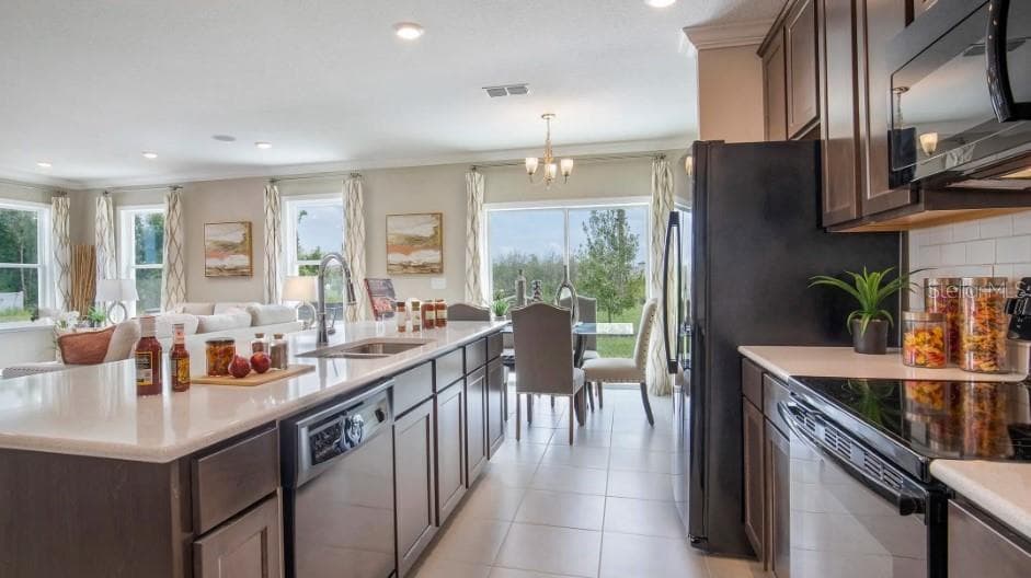 Model home - actual features may vary. - 1465 TRINIDAD ST, DELAND