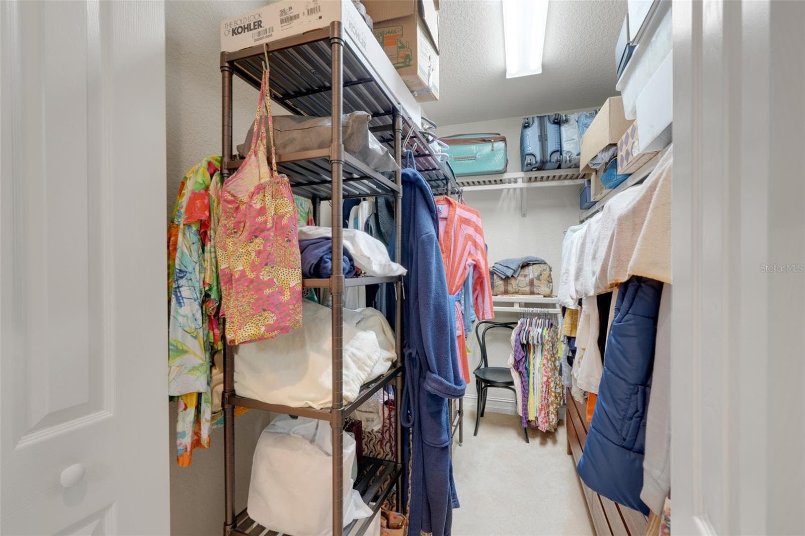 Master walk-in closet 5'11" X 9' X 3" - 26206 AVENIDA LAS COLINAS #4A, HOWEY IN THE HILLS