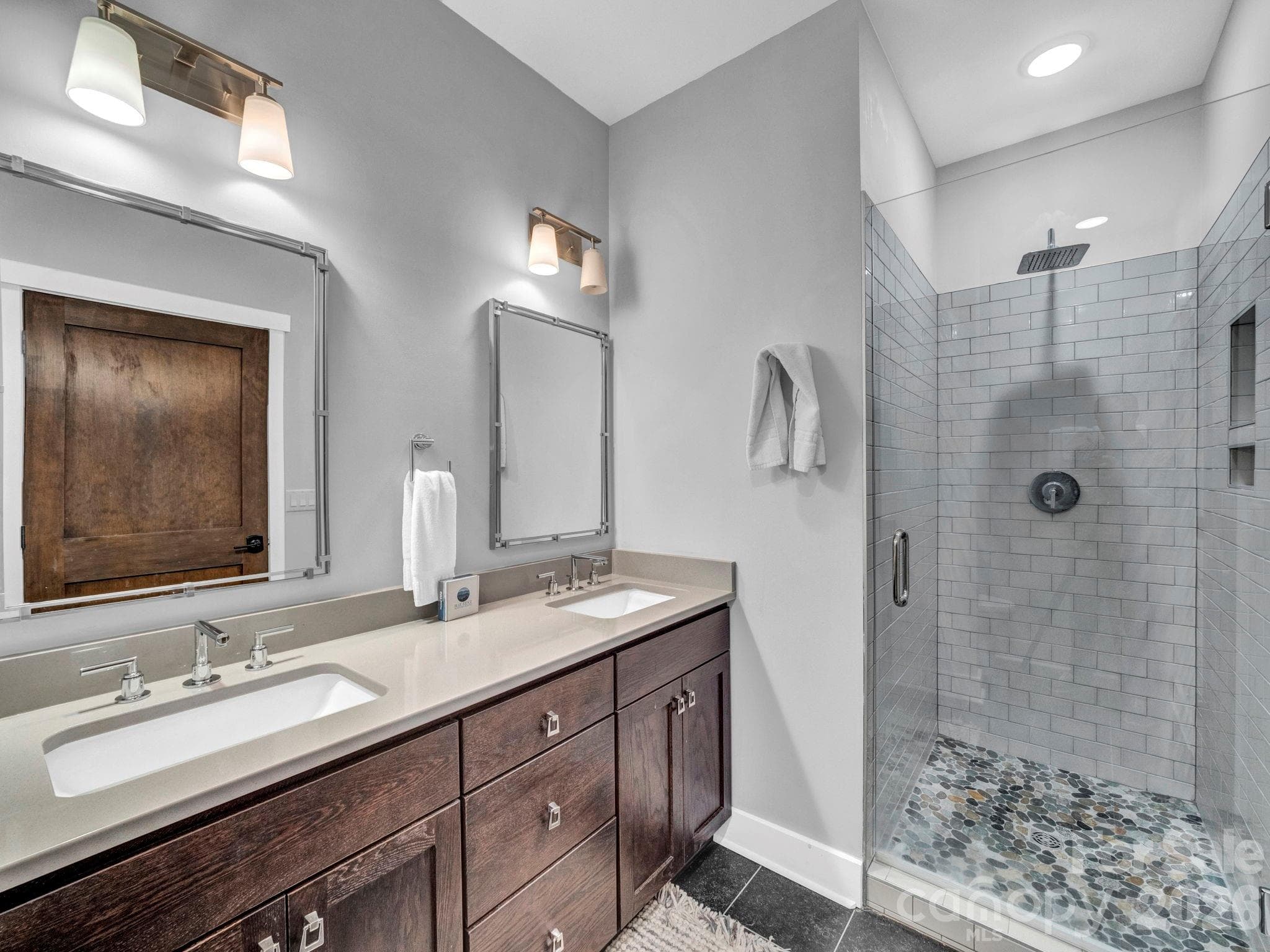 Primary bathroom with double venity and tile shower - 198 Ramblestone Terrace, Boone