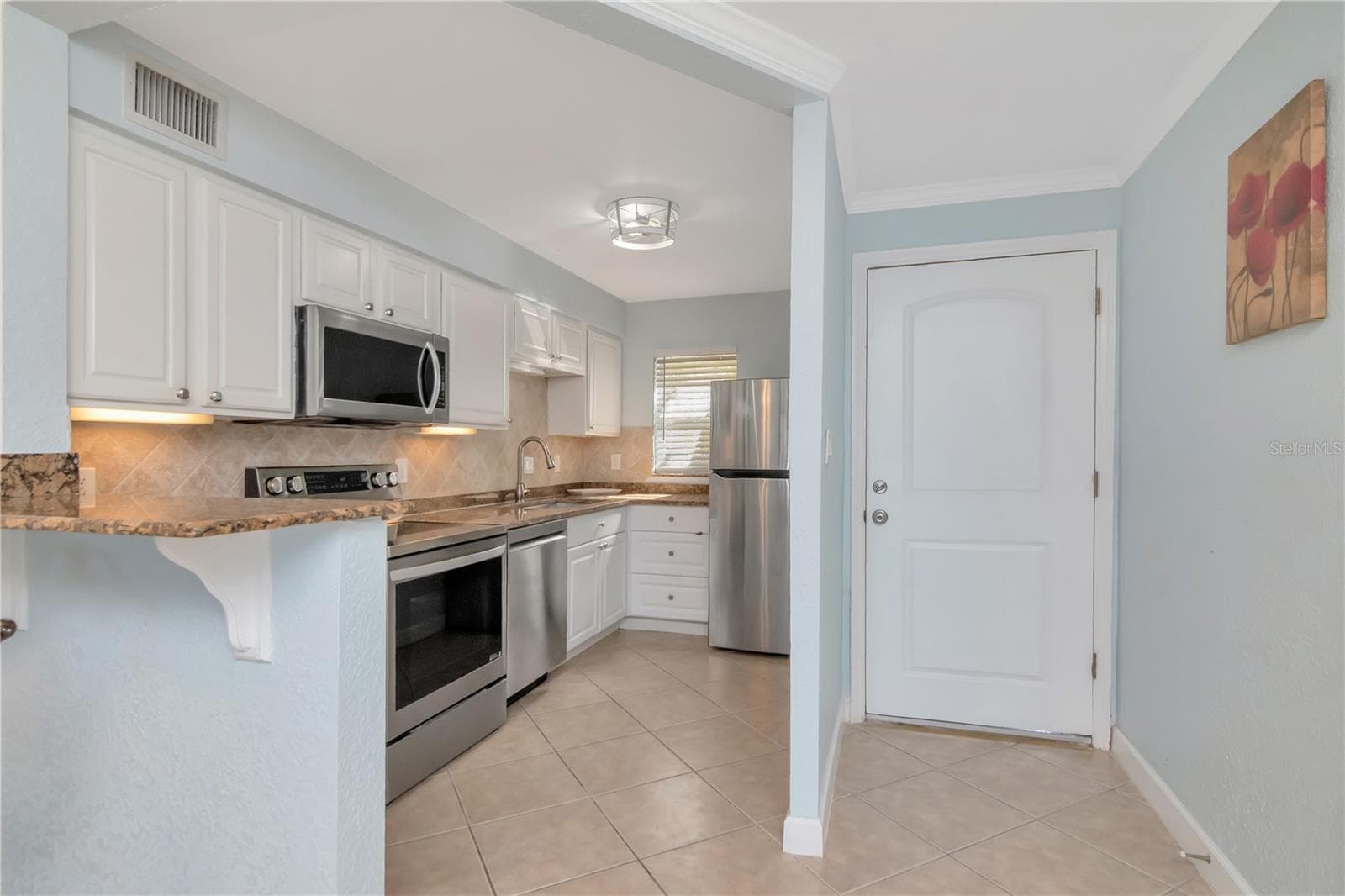 Front door - Kitchen - 2675 ST JOSEPHS DR E #B, DUNEDIN