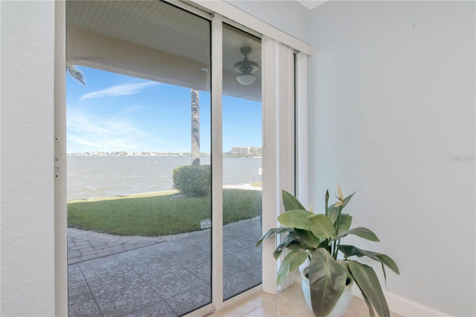Step Out to Your Private Patio & Water Views - 2675 ST JOSEPHS DR E #B, DUNEDIN