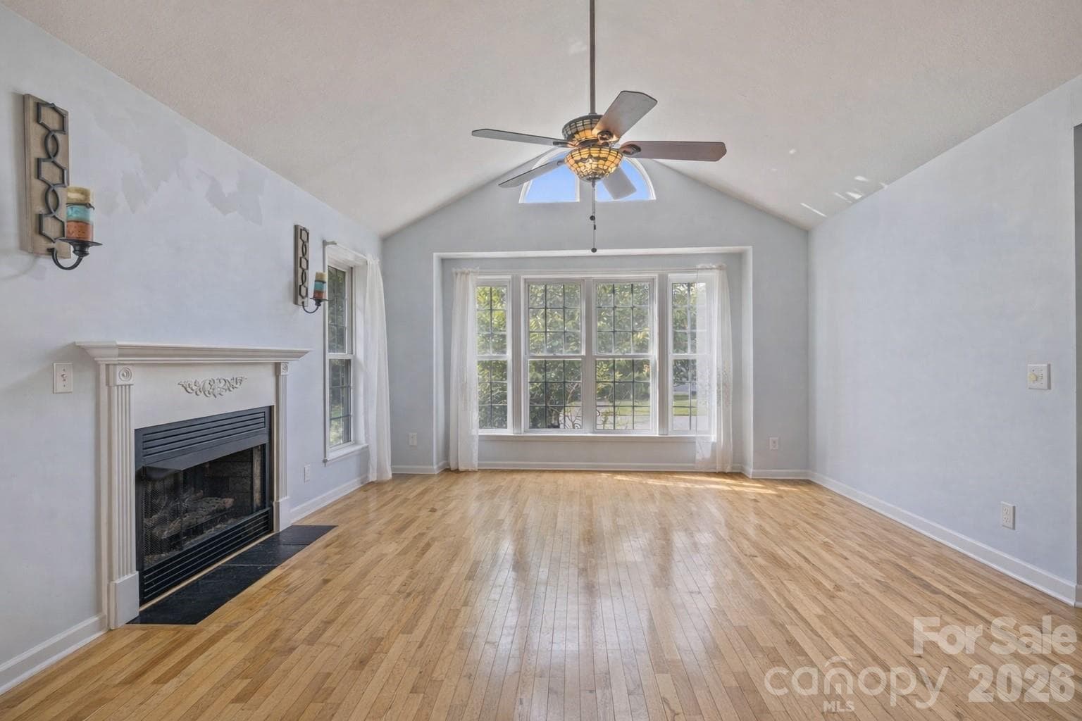 living room- photo virtually altered to remove furniture - 372 Kingfisher Lane, Mills River