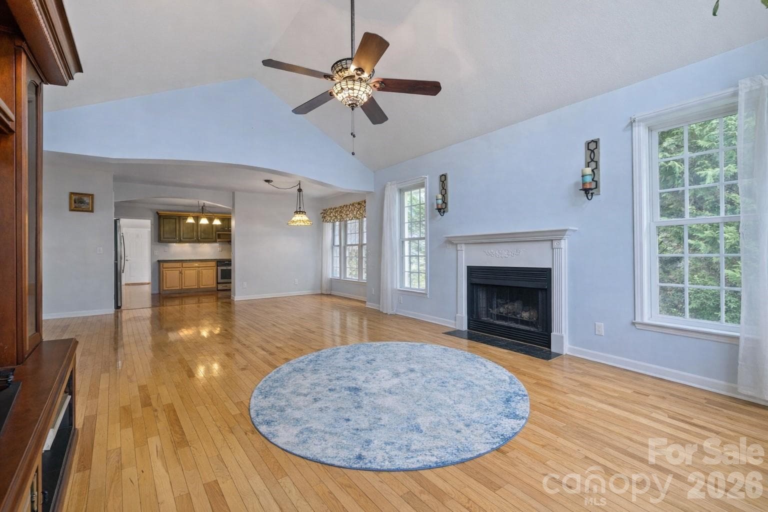 living room- photo virtually altered to remove furniture - 372 Kingfisher Lane, Mills River