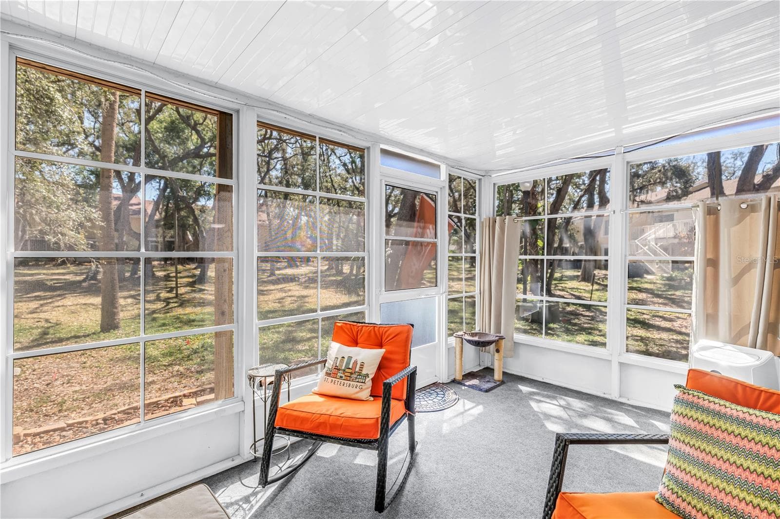 Private and peaceful park view with an additional 153 sq ft of climate controlled space - 3620 41ST WAY S #F, ST PETERSBURG