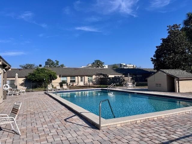 Community Pool-Hospital in Background - 370 WINDMEADOWS ST #370, ALTAMONTE SPRINGS