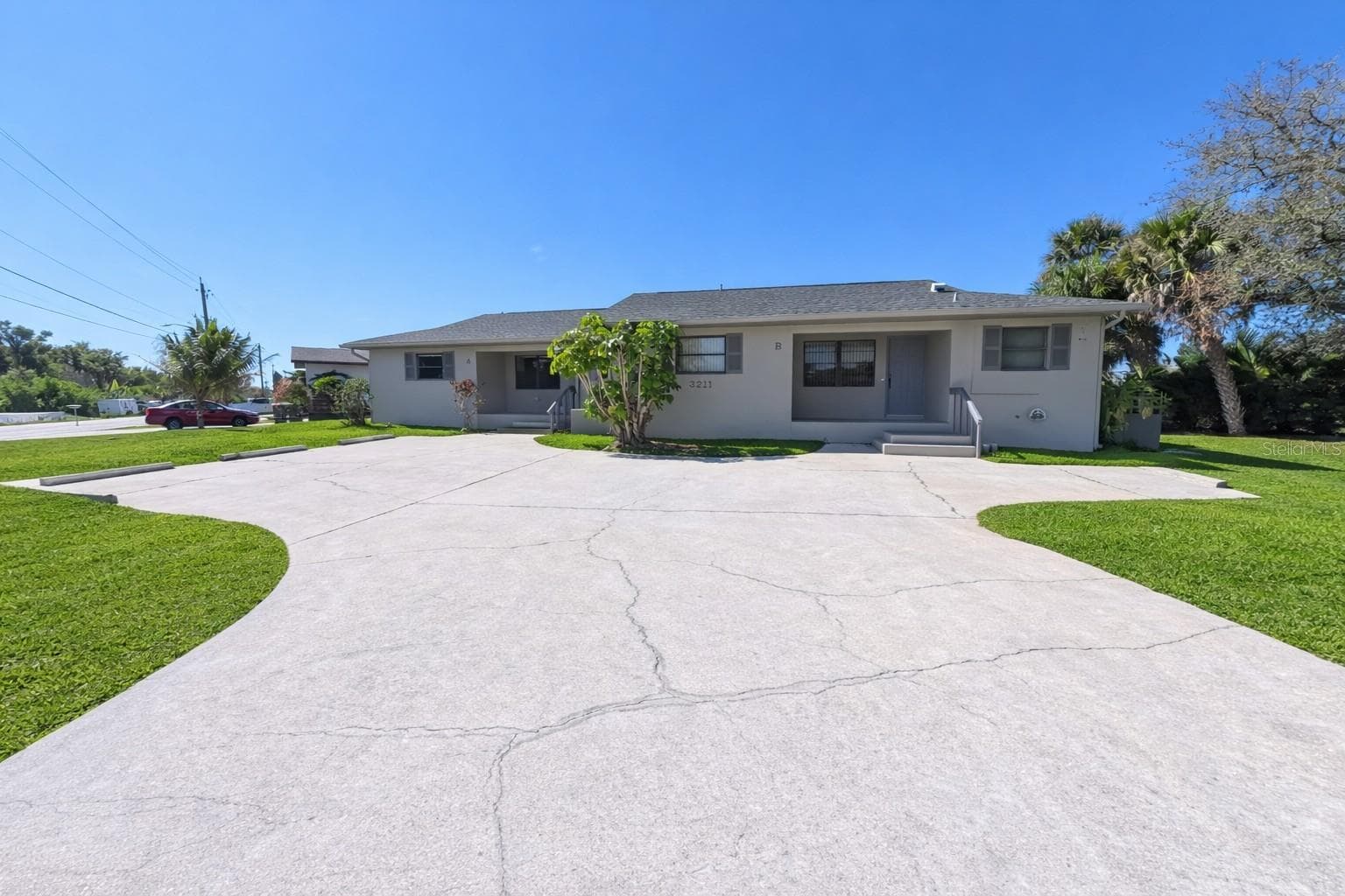 Front Elevation and parking - 3211 RIVERSIDE DR, PUNTA GORDA