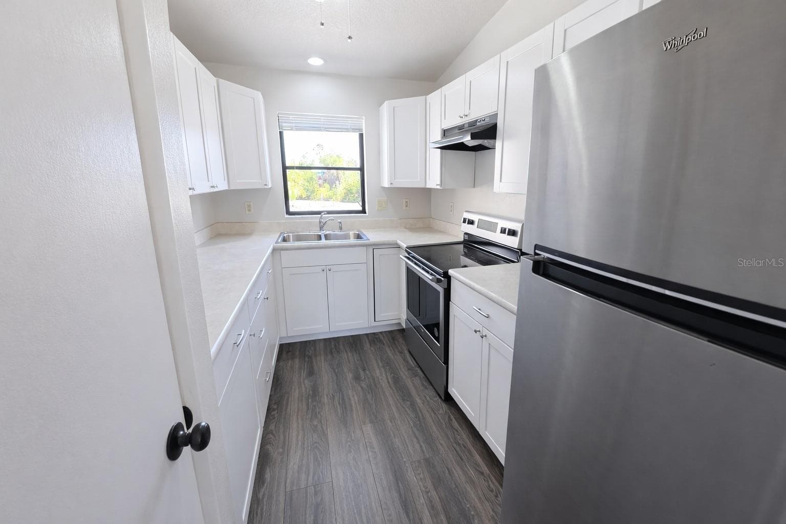 Unit A kitchen - 3211 RIVERSIDE DR, PUNTA GORDA