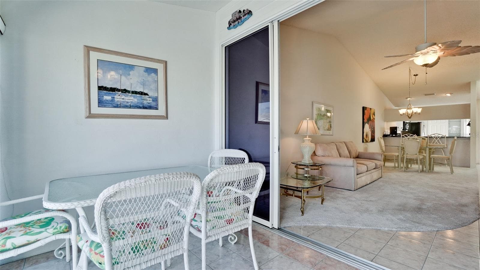 FLORIDA ROOM GLASS ENCLOSED LEADS TO DECK - 507 SANDERLING CIR, BRADENTON