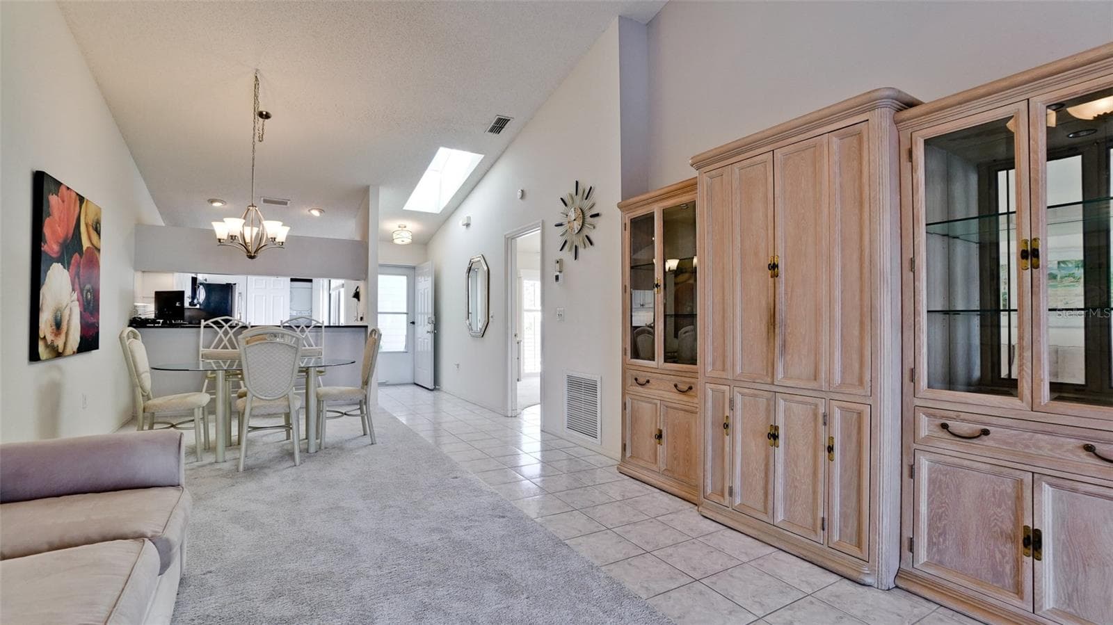 TV ENCLOSED IN ENTERTAINMENT CENTER - 507 SANDERLING CIR, BRADENTON