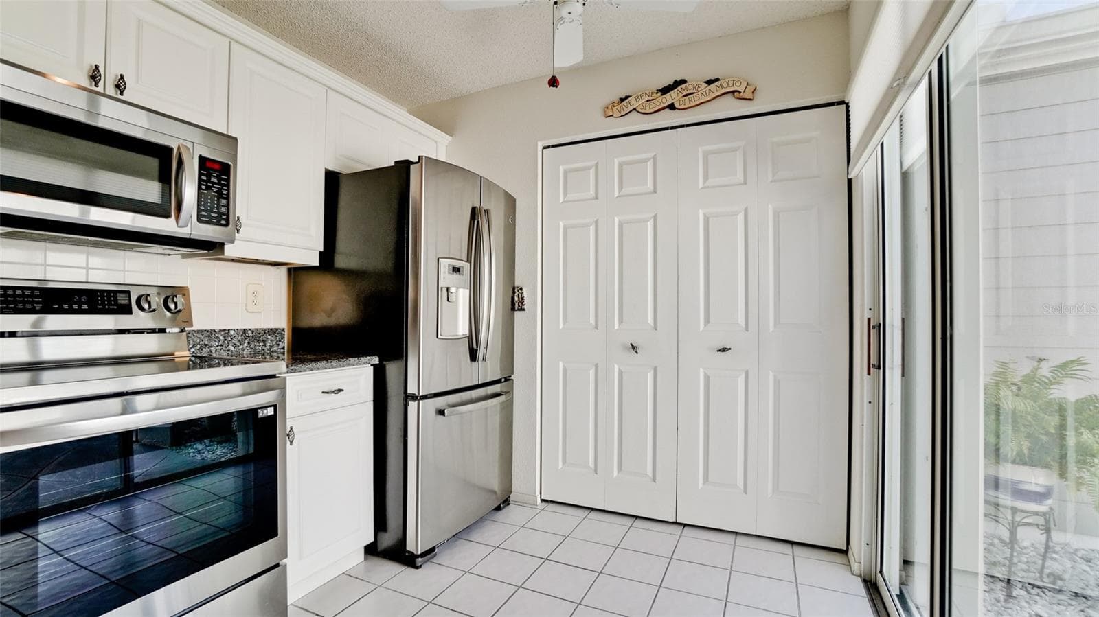 WASHER/DRYER BEHIND DOOR - 507 SANDERLING CIR, BRADENTON