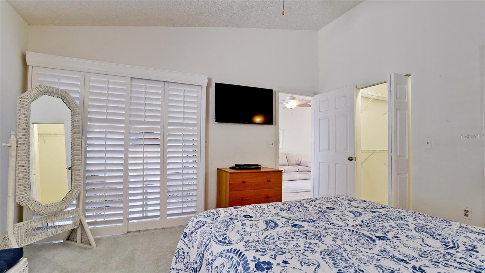 WHITE PLANTATION SHUTTERS ON SLIDER & WINDOW - 507 SANDERLING CIR, BRADENTON