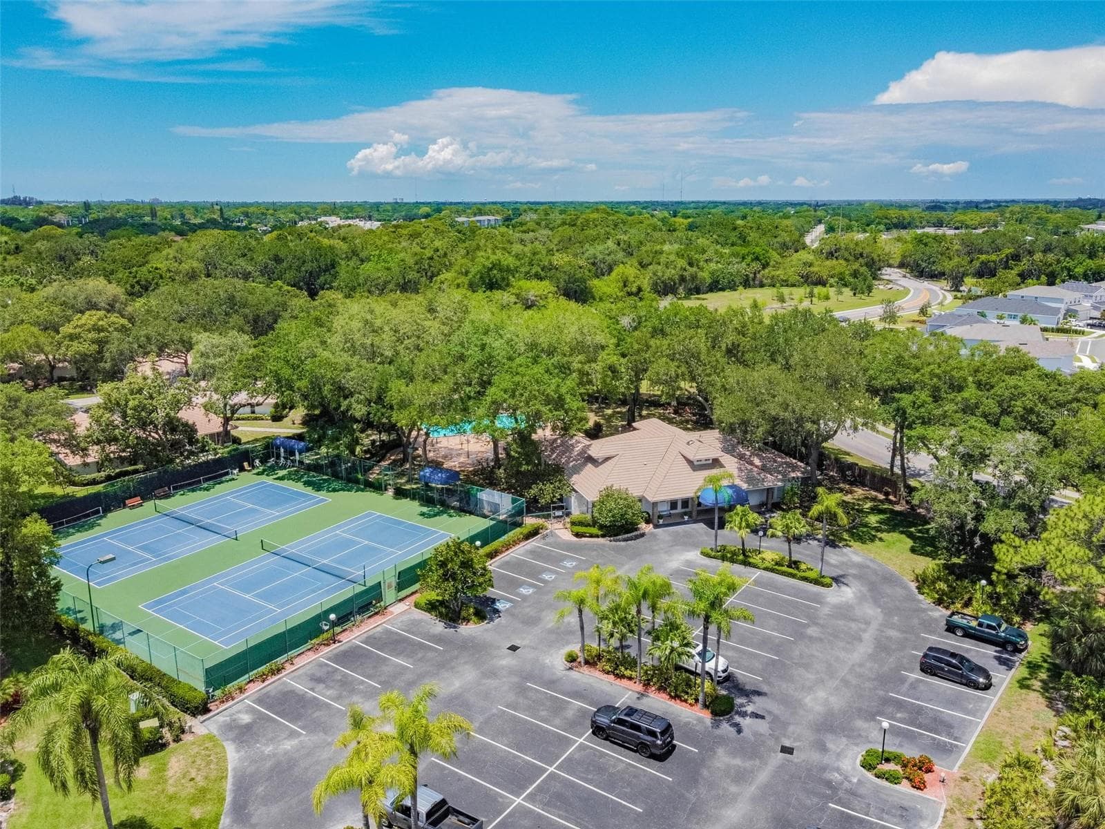 Aerial of the clubhouse and amenities. - 5611 GARDEN LAKES DR, BRADENTON