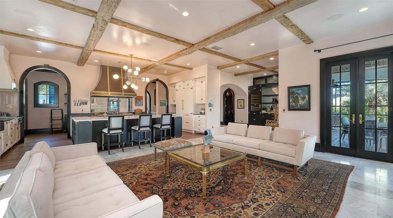 Open-concept living and chef’s kitchen - 513 VILLA ROSA WAY, ANNA MARIA