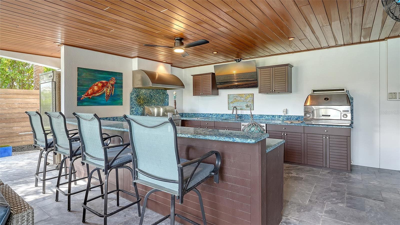 Outdoor kitchen with built-in pizza oven - 513 VILLA ROSA WAY, ANNA MARIA