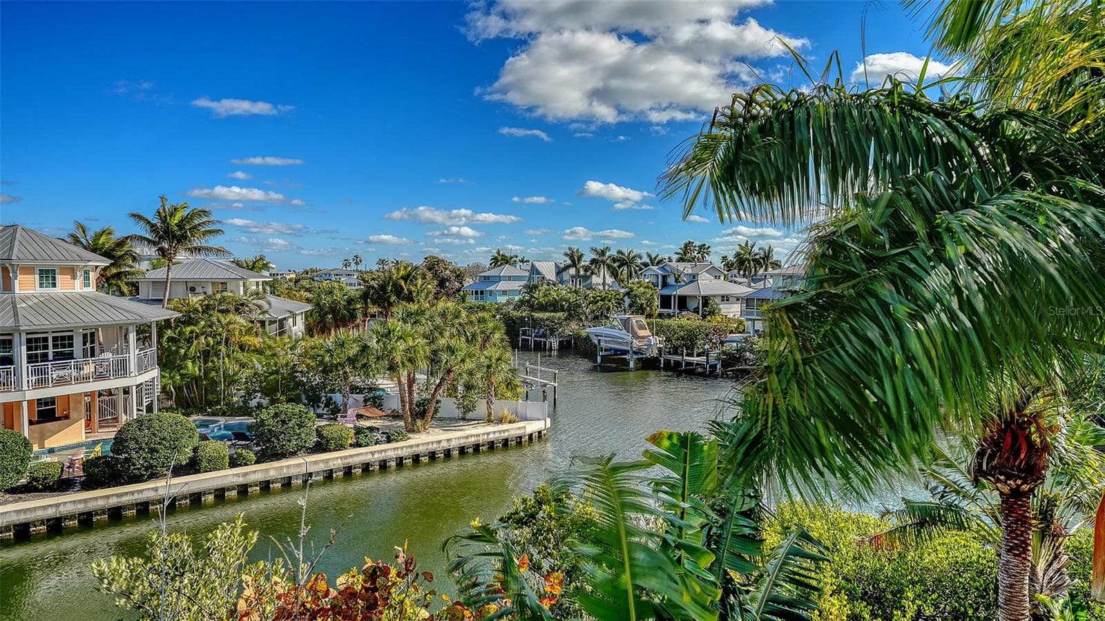 Peaceful canal views surrounded by palms - 513 VILLA ROSA WAY, ANNA MARIA