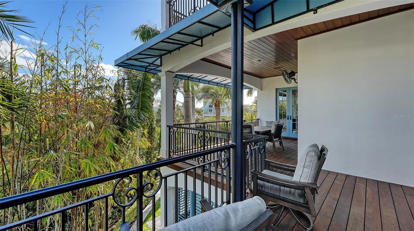 Private balcony surrounded by tropical greenery - 513 VILLA ROSA WAY, ANNA MARIA