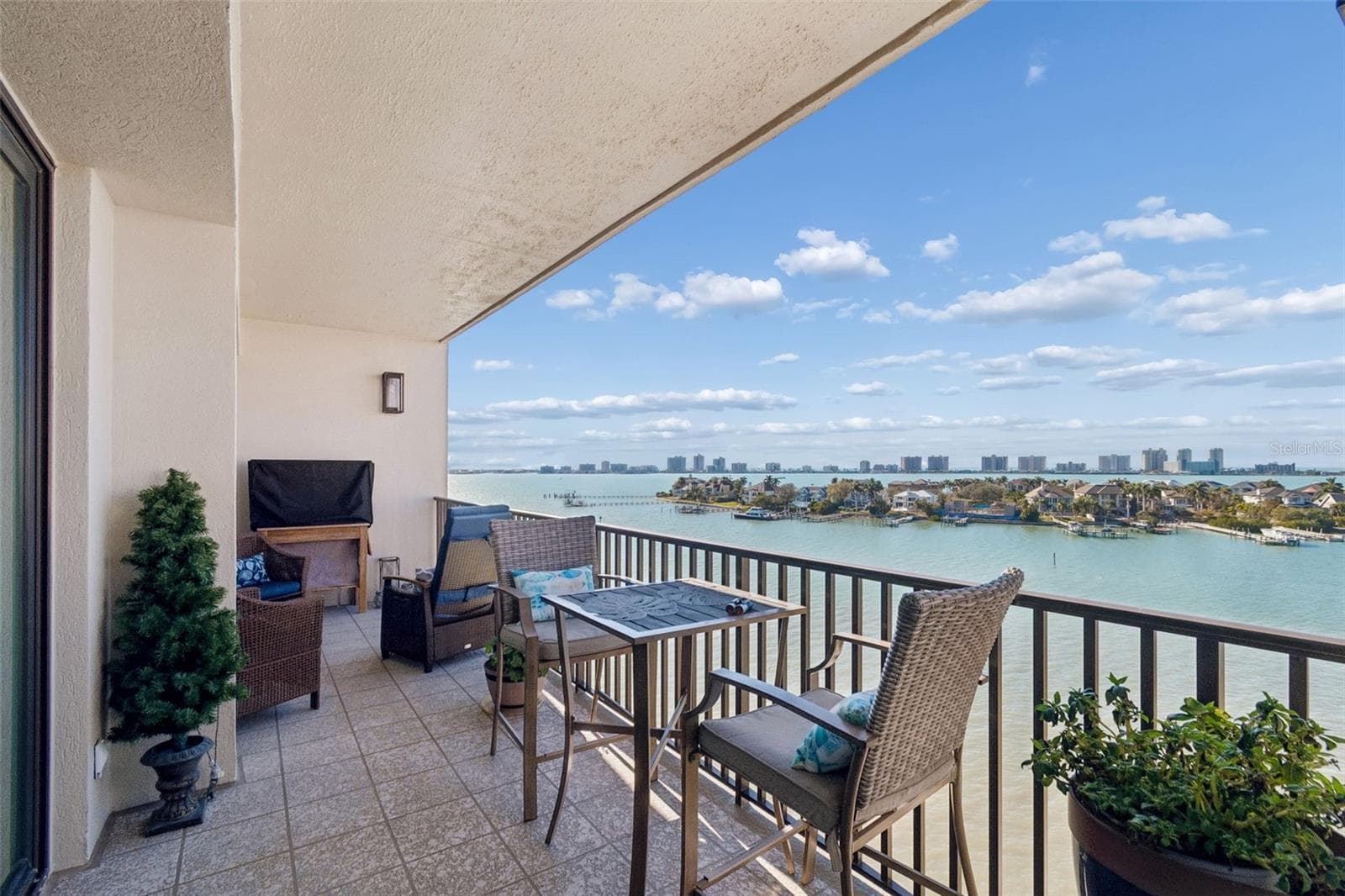 Hurricane Sliding Glass Doors lead to comfy balcony and breath-taking views! - 4 BELLEVIEW BLVD #701, BELLEAIR