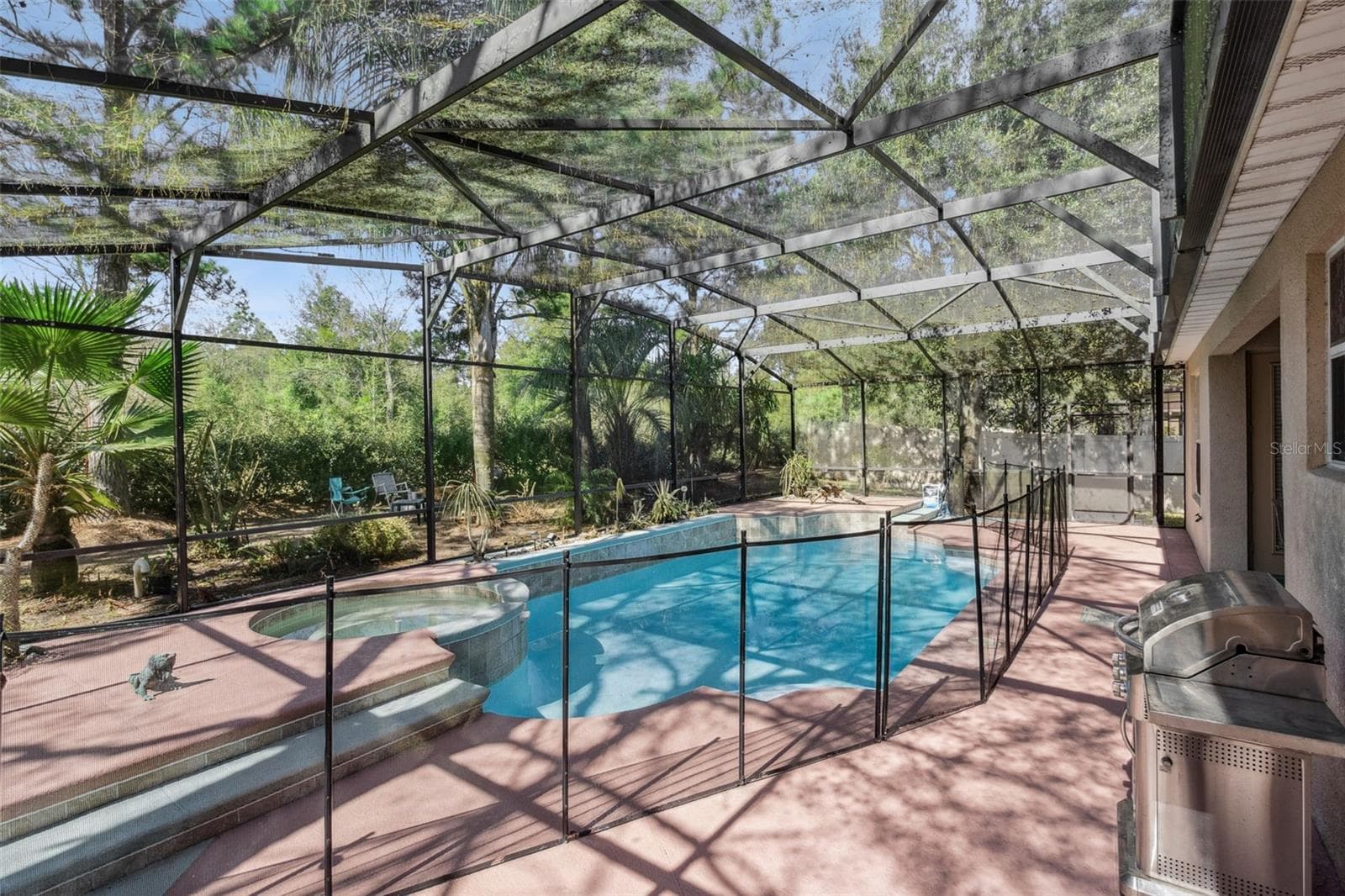 Screened pool area designed for everyday use and entertaining - 30337 GIDRAN TER, MOUNT DORA