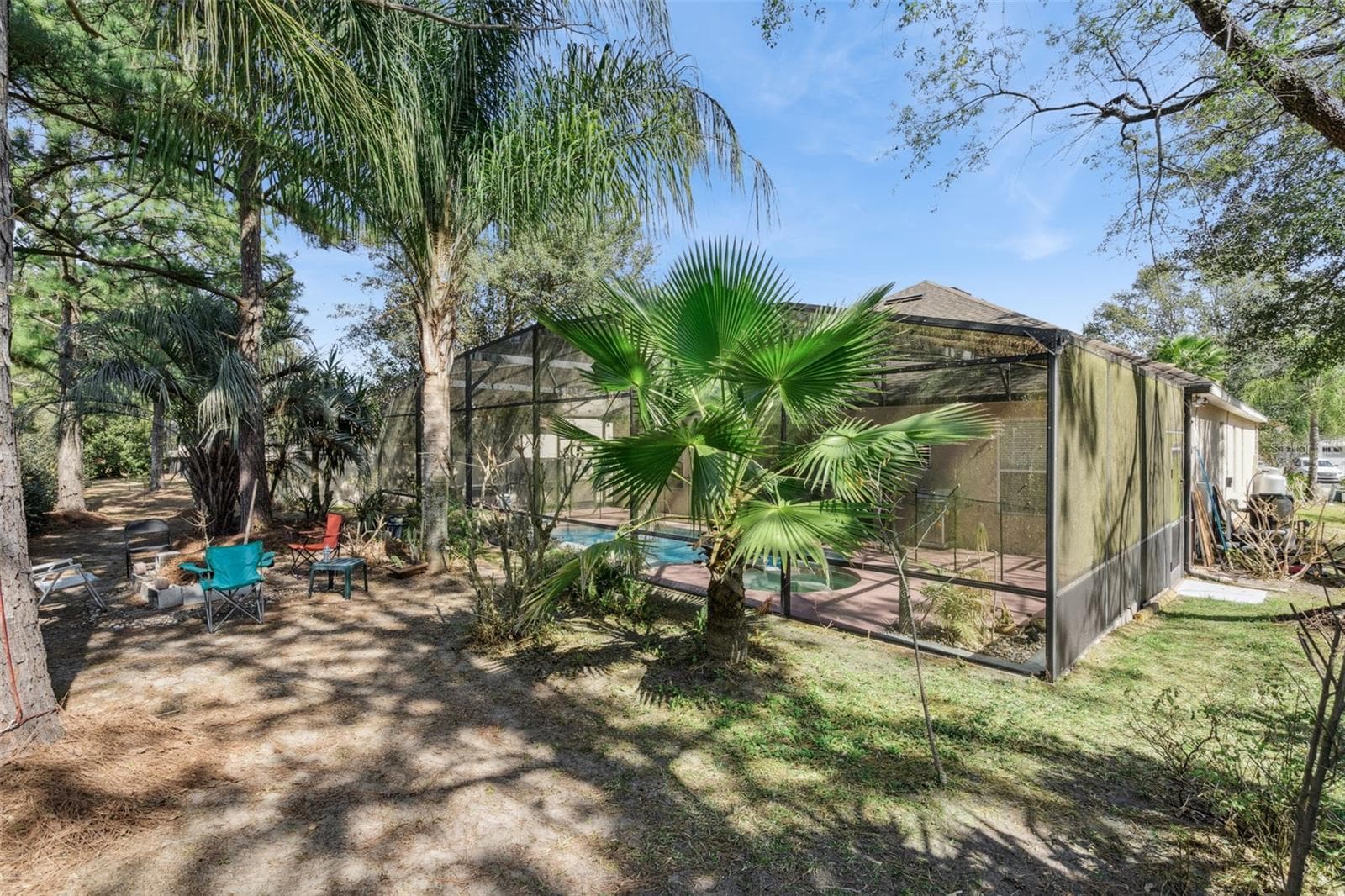 Dedicated firepit area extending usable outdoor living space - 30337 GIDRAN TER, MOUNT DORA
