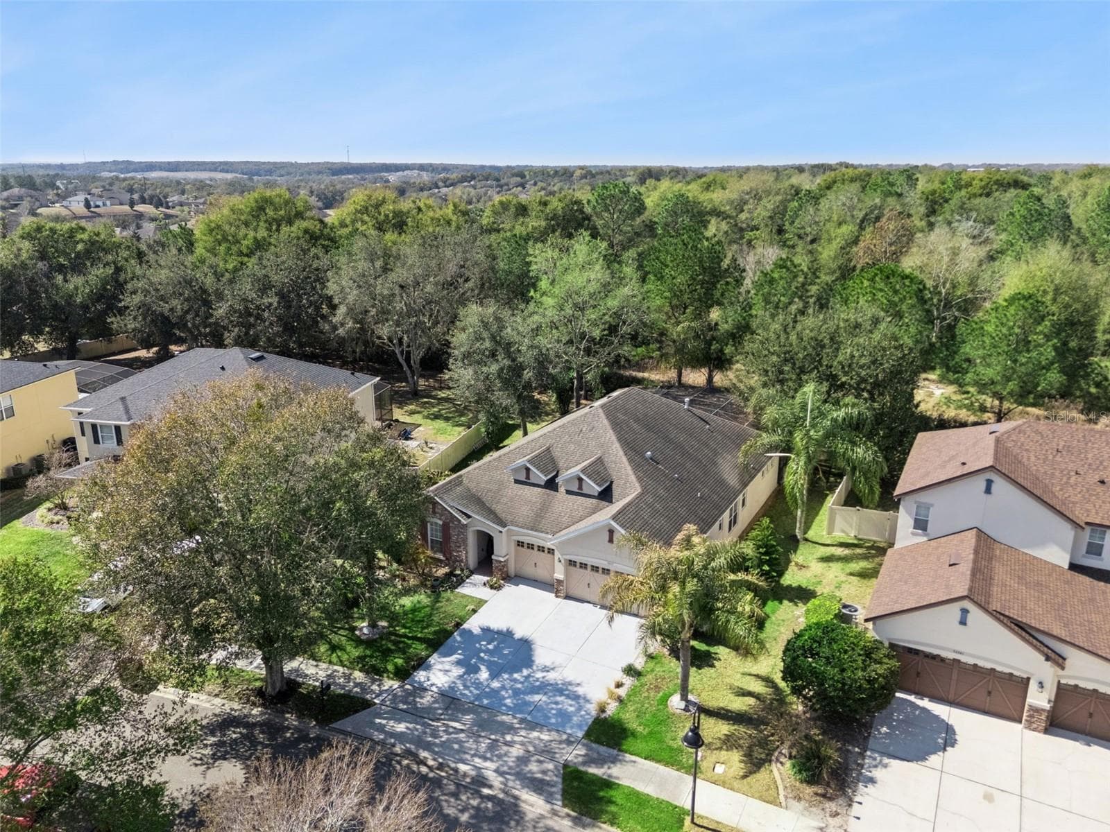 Backyard with conservation/green-space views offering privacy - 30337 GIDRAN TER, MOUNT DORA