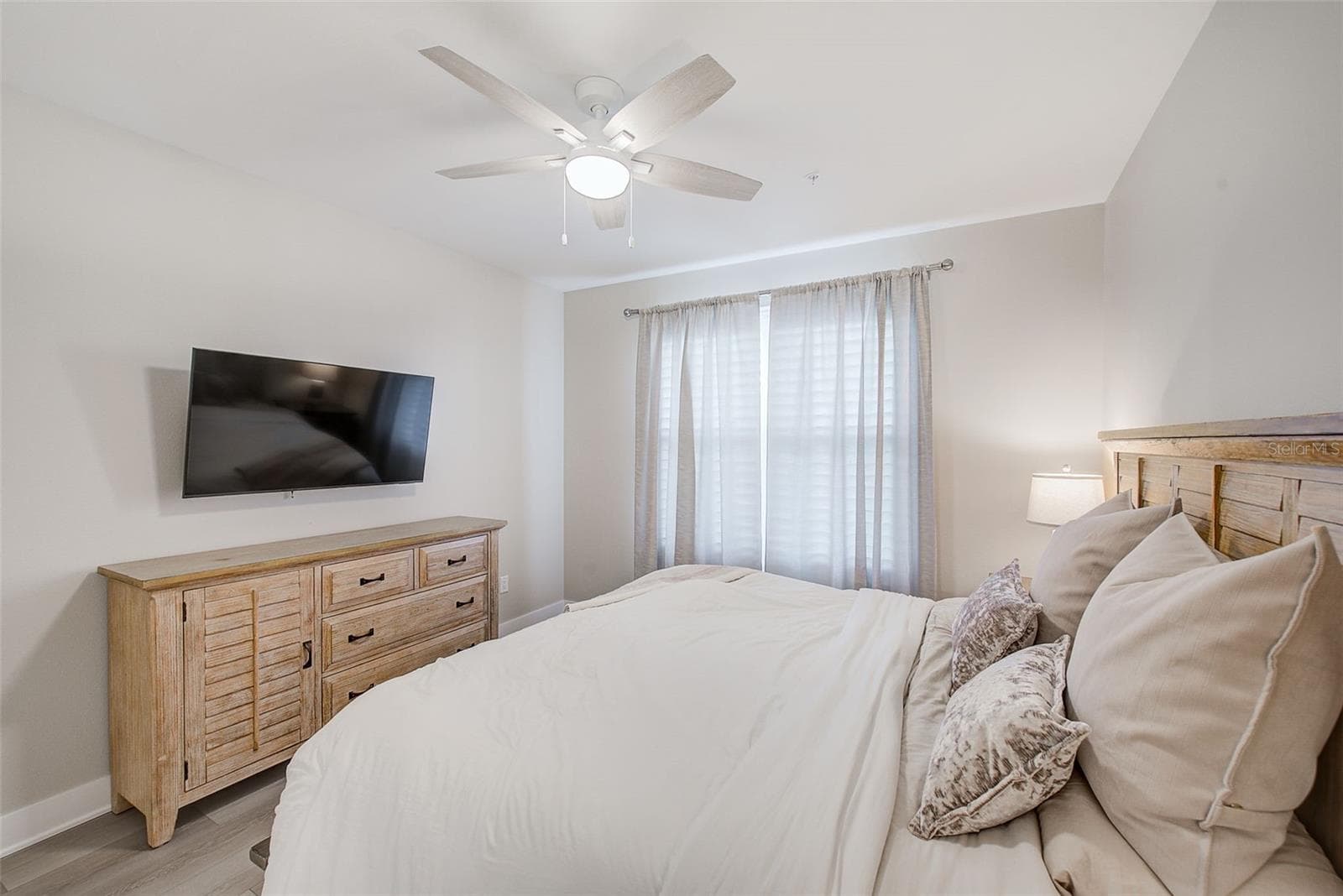 Bedroom 2 with Plantation shutters. - 400 150TH AVE #504, MADEIRA BEACH