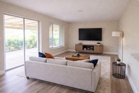 staged family room - 1350 GLENGARRY DR, PALM HARBOR